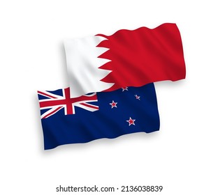 National vector fabric wave flags of New Zealand and Bahrain isolated on white background. 1 to 2 proportion.