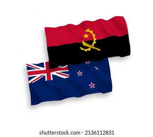 National vector fabric wave flags of New Zealand and Angola isolated on white background. 1 to 2 proportion.