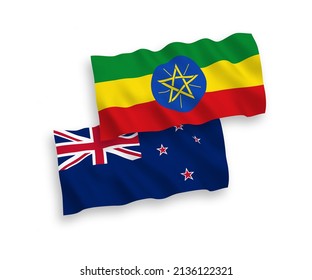 National vector fabric wave flags of New Zealand and Ethiopia isolated on white background. 1 to 2 proportion.