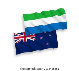National vector fabric wave flags of New Zealand and Sierra Leone isolated on white background. 1 to 2 proportion.