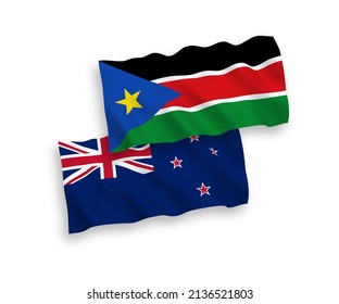 National vector fabric wave flags of New Zealand and Republic of South Sudan isolated on white background. 1 to 2 proportion.