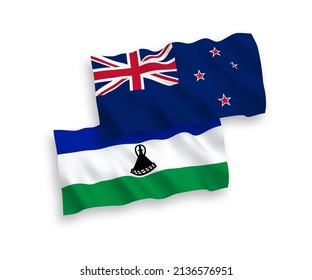 National vector fabric wave flags of New Zealand and Lesotho isolated on white background. 1 to 2 proportion.