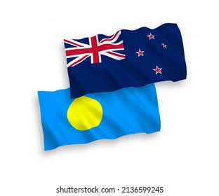 National vector fabric wave flags of New Zealand and Palau isolated on white background. 1 to 2 proportion.