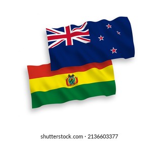 Banderas de olas de tela vectorial nacional de Nueva Zelanda y Bolivia aisladas en fondo blanco. de 1 a 2.