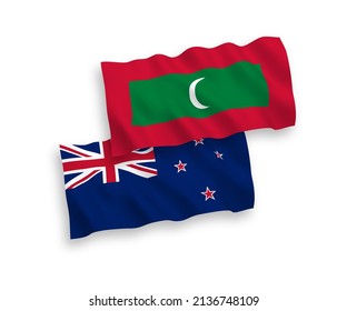 National vector fabric wave flags of New Zealand and Maldives isolated on white background. 1 to 2 proportion.