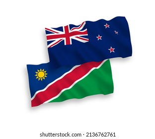 Banderas de olas de tela vectorial nacional de Nueva Zelandia y la República de Namibia aisladas en fondo blanco. de 1 a 2.