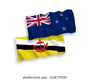 Nationale Vektorgrafik-Wellenflags von Neuseeland und Brunei einzeln auf weißem Hintergrund. 1 bis 2 %.