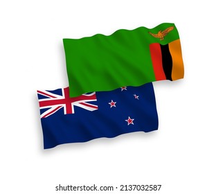 National vector fabric wave flags of New Zealand and Republic of Zambia isolated on white background. 1 to 2 proportion.