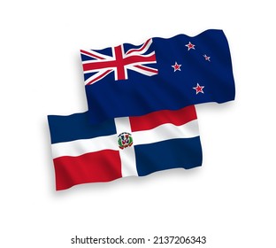 National vector fabric wave flags of New Zealand and Dominican Republic isolated on white background. 1 to 2 proportion.
