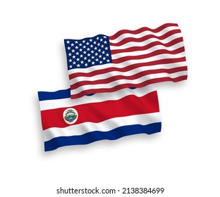 National vector fabric wave flags of Republic of Costa Rica and USA isolated on white background. 1 to 2 proportion.