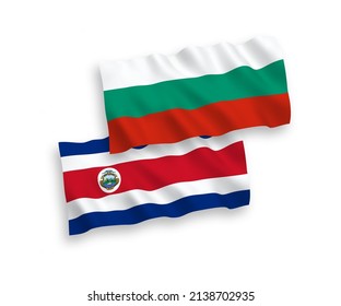 National vector fabric wave flags of Bulgaria and Republic of Costa Rica isolated on white background. 1 to 2 proportion.