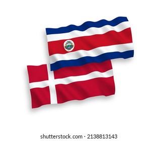 National vector fabric wave flags of Denmark and Republic of Costa Rica isolated on white background. 1 to 2 proportion.