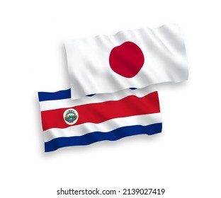 Banderas de olas de tela vectorial nacional del Japón y la República de Costa Rica aisladas en fondo blanco. de 1 a 2.