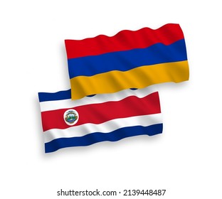 National vector fabric wave flags of Republic of Costa Rica and Armenia isolated on white background. 1 to 2 proportion.