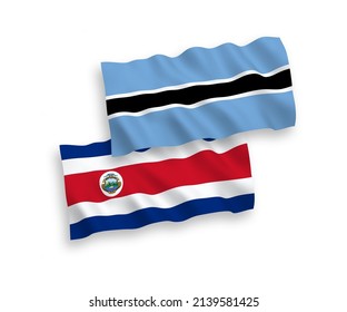 National vector fabric wave flags of Republic of Costa Rica and Botswana isolated on white background. 1 to 2 proportion.