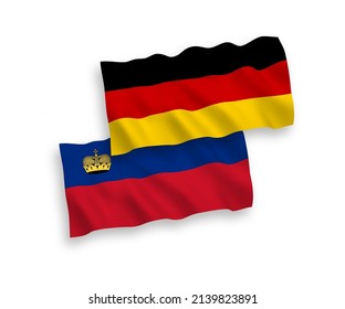 National vector fabric wave flags of Germany and Liechtenstein isolated on white background. 1 to 2 proportion.