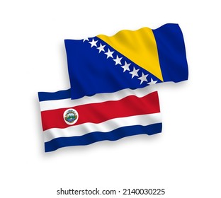 Banderas de olas de tela vectorial nacional de la República de Costa Rica y Bosnia y Herzegovina aisladas en fondo blanco. de 1 a 2.