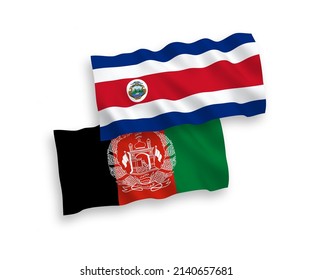 National vector fabric wave flags of Republic of Costa Rica and Islamic Republic of Afghanistan isolated on white background. 1 to 2 proportion.
