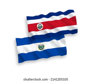 National vector fabric wave flags of Republic of Costa Rica and Republic of El Salvador isolated on white background. 1 to 2 proportion.