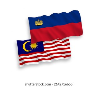 National vector fabric wave flags of Liechtenstein and Malaysia isolated on white background. 1 to 2 proportion.
