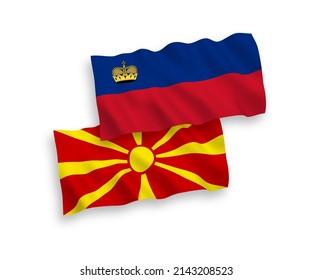 Banderas de ondulación de tela vectorial nacional de Liechtenstein y Macedonia del Norte aisladas en fondo blanco. de 1 a 2.