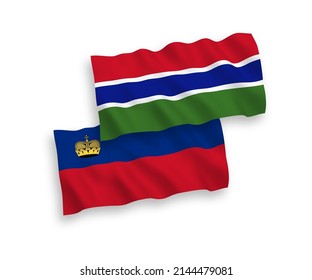 National vector fabric wave flags of Liechtenstein and Republic of Gambia isolated on white background. 1 to 2 proportion.