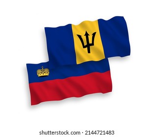 National vector fabric wave flags of Liechtenstein and Barbados isolated on white background. 1 to 2 proportion.