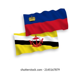 National vector fabric wave flags of Liechtenstein and Brunei isolated on white background. 1 to 2 proportion.