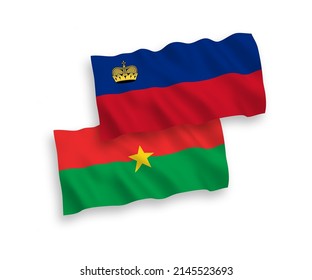 Banderas de ondulación de tela vectorial nacional de Liechtenstein y Burkina Faso aisladas sobre fondo blanco. de 1 a 2.