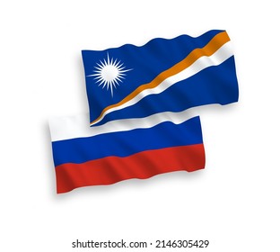 Banderas de olas de tela vectorial nacional de la República de las Islas Marshall y Rusia aisladas en un fondo blanco. de 1 a 2.