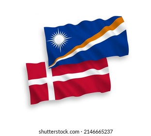 National vector fabric wave flags of Denmark and Republic of the Marshall Islands isolated on white background. 1 to 2 proportion.