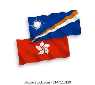 National vector fabric wave flags of Republic of the Marshall Islands and Hong Kong isolated on white background. 1 to 2 proportion.