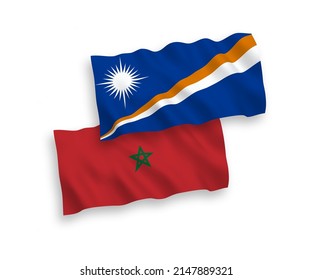 National vector fabric wave flags of Republic of the Marshall Islands and Morocco isolated on white background. 1 to 2 proportion.