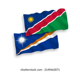 National vector fabric wave flags of Republic of the Marshall Islands and Republic of Namibia isolated on white background. 1 to 2 proportion.