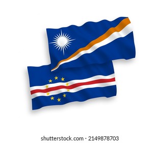 National vector fabric wave flags of Republic of the Marshall Islands and Republic of Cabo Verde isolated on white background. 1 to 2 proportion.