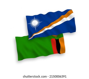 National vector fabric wave flags of Republic of the Marshall Islands and Republic of Zambia isolated on white background. 1 to 2 proportion.
