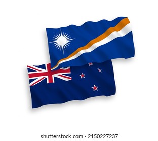 National vector fabric wave flags of Republic of the Marshall Islands and New Zealand isolated on white background. 1 to 2 proportion.