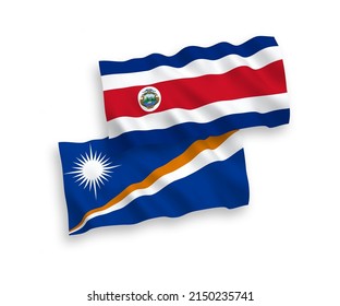 Banderas de olas de tela vectorial nacional de la República de las Islas Marshall y la República de Costa Rica aisladas en fondo blanco. de 1 a 2.