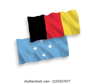 National vector fabric wave flags of Federated States of Micronesia and Belgium isolated on white background. 1 to 2 proportion.