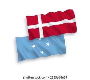 National vector fabric wave flags of Denmark and Federated States of Micronesia isolated on white background. 1 to 2 proportion.