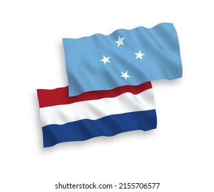 National vector fabric wave flags of Federated States of Micronesia and Netherlands isolated on white background. 1 to 2 proportion.
