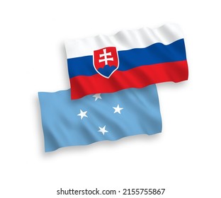 National vector fabric wave flags of Slovakia and Federated States of Micronesia isolated on white background. 1 to 2 proportion.