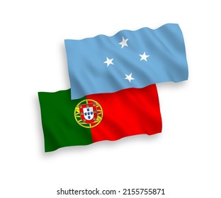 National vector fabric wave flags of Portugal and Federated States of Micronesia isolated on white background. 1 to 2 proportion.
