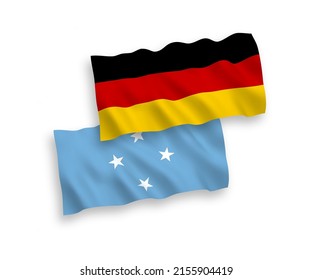National vector fabric wave flags of Germany and Federated States of Micronesia isolated on white background. 1 to 2 proportion.
