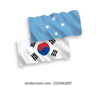 Banderas de ondulación de tela vectorial nacional de Corea del Sur y Estados Federados de Micronesia aislados en fondo blanco. de 1 a 2.