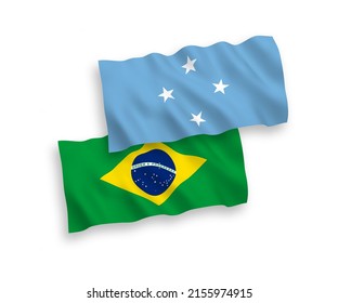 National vector fabric wave flags of Brazil and Federated States of Micronesia isolated on white background. 1 to 2 proportion.