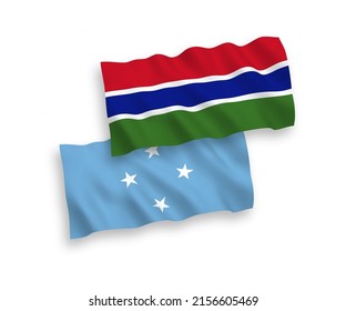 National vector fabric wave flags of Federated States of Micronesia and Republic of Gambia isolated on white background. 1 to 2 proportion.