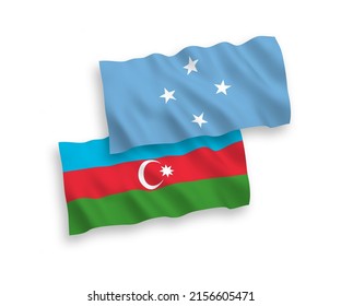 Banderas de ondulación de tela vectorial nacional de los Estados Federados de Micronesia y Azerbaiyán aisladas de fondo blanco. de 1 a 2.