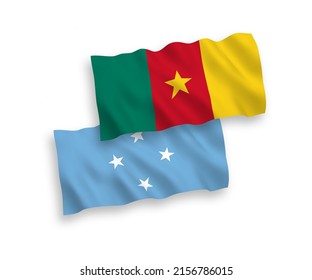 National vector fabric wave flags of Federated States of Micronesia and Cameroon isolated on white background. 1 to 2 proportion.