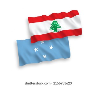 National vector fabric wave flags of Federated States of Micronesia and Lebanon isolated on white background. 1 to 2 proportion.